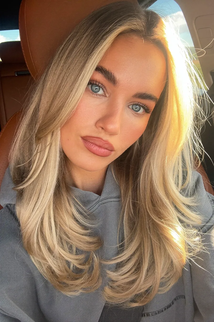 Face-Framing Ash Blonde Long Layered Blowout for Natural Dimension
