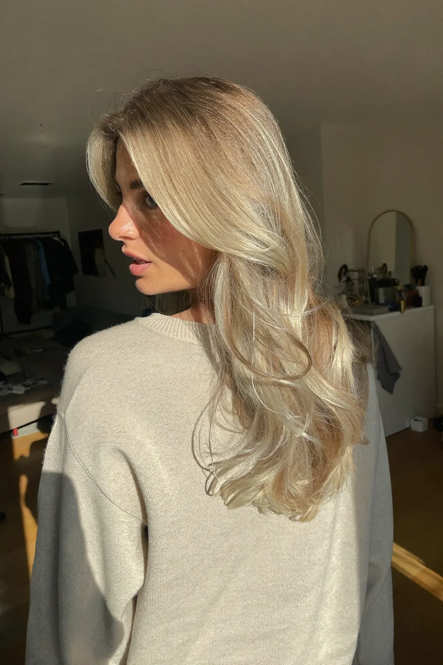 Softly Layered Ash Blonde Long Layered Haircut with Face-Framing Movement
