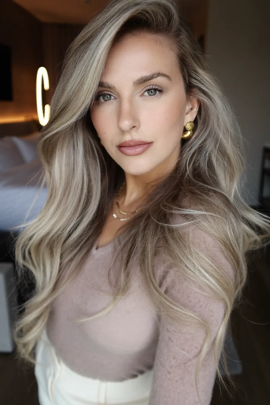 Voluminous Ash Blonde Long Layered Cut with Side Part