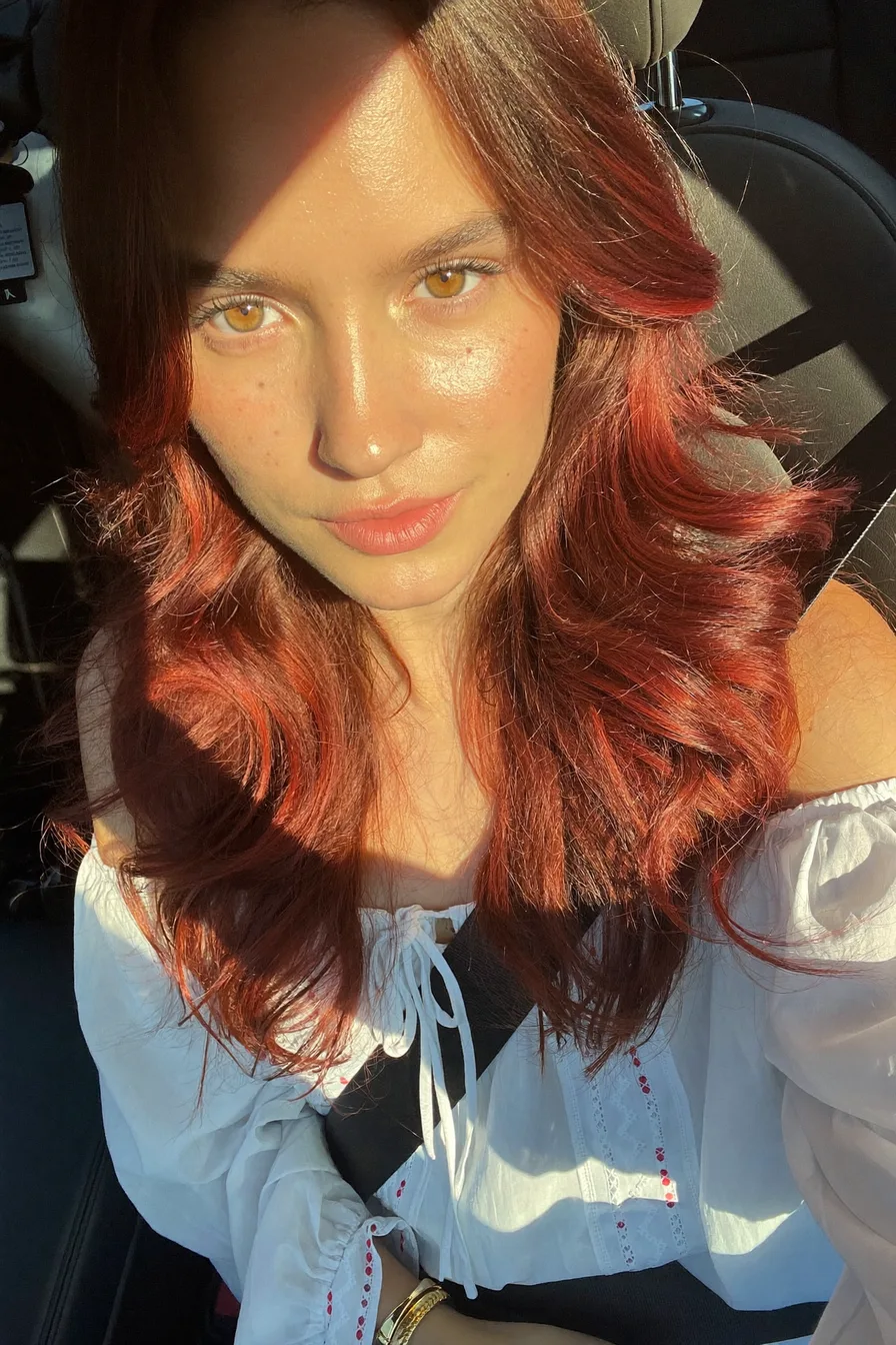 Voluminous Auburn Red Long Layered Waves With Face-Framing Layers