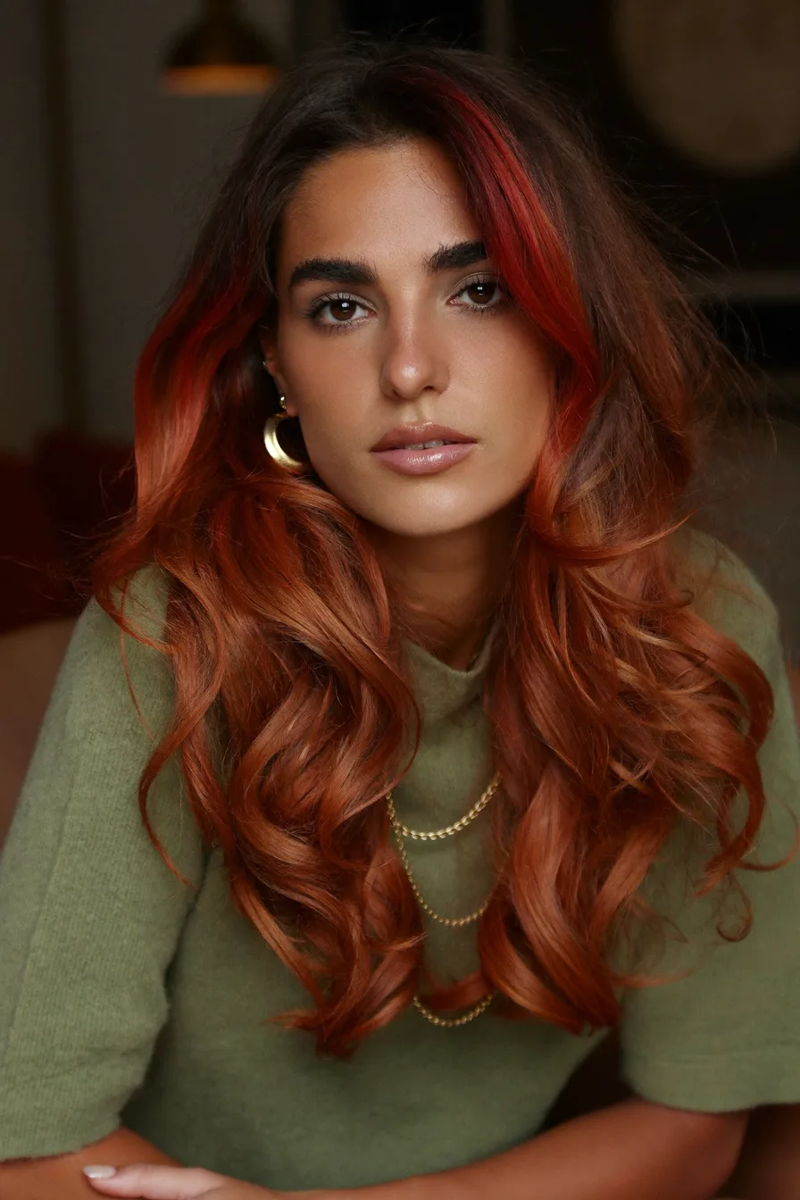 Glamorous Auburn Red Long Layered Waves for Lively Volume