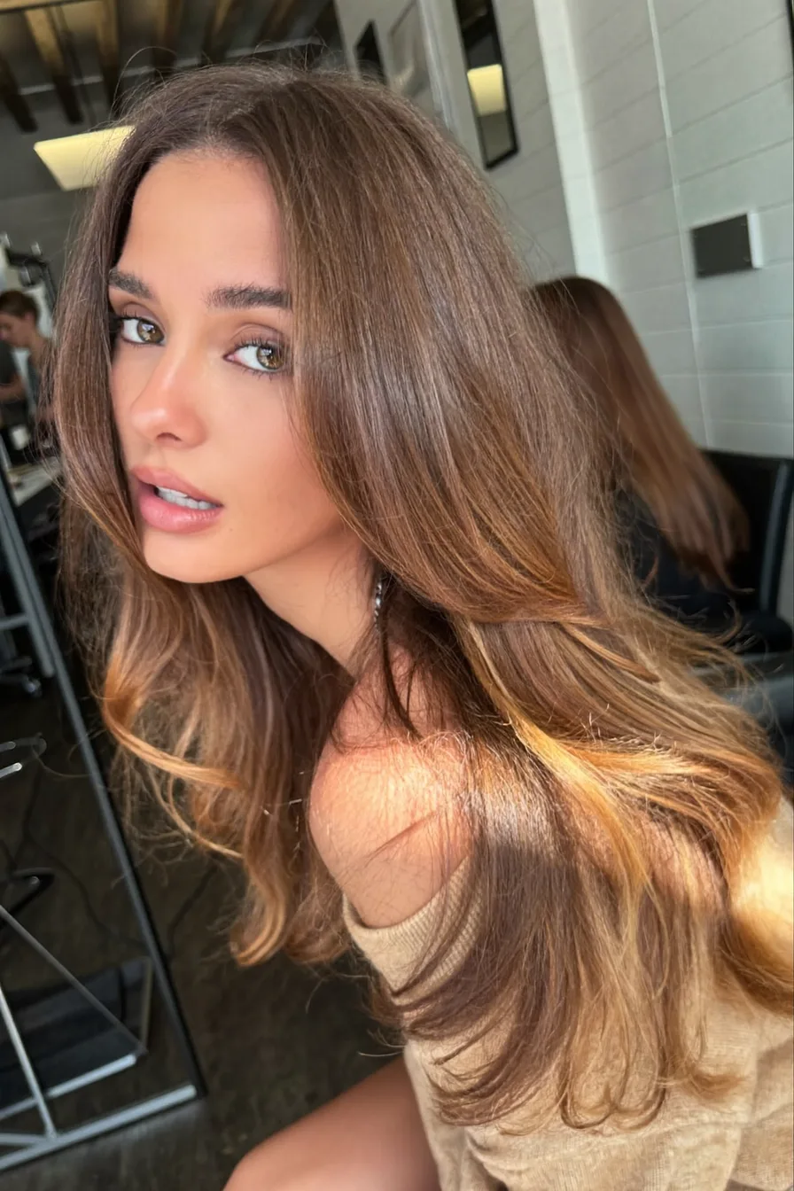 Radiant Caramel Brown Long Layered Haircut with Natural Volume