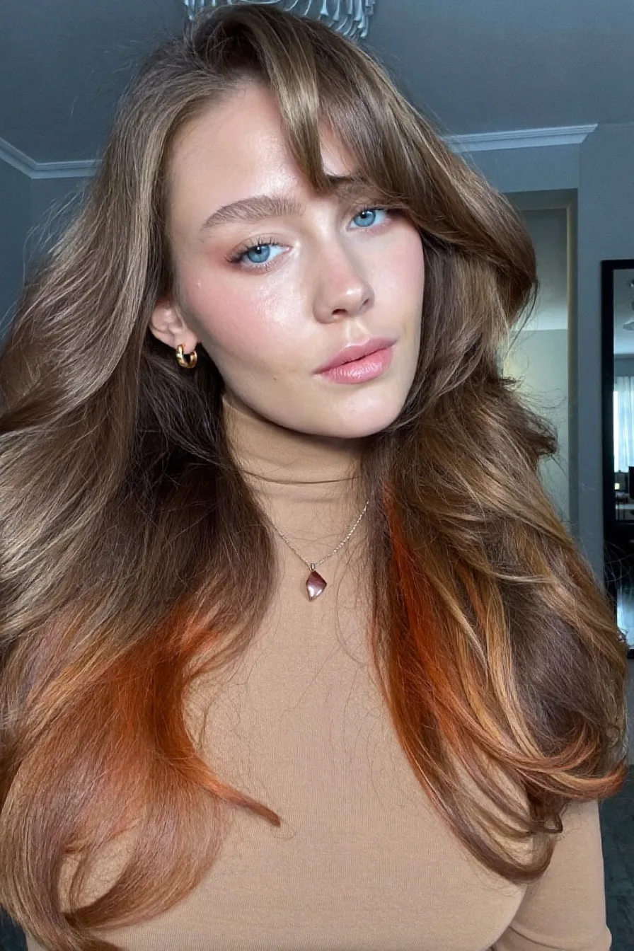 Voluminous Chestnut Brown Long Layered Hair with Warm Highlights