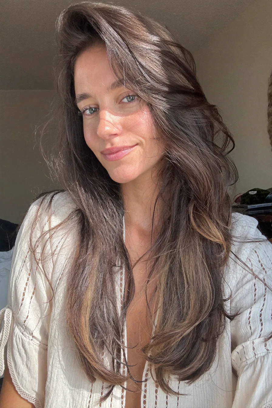 Soft and Voluminous Chestnut Brown Long Layered Haircut Inspiration