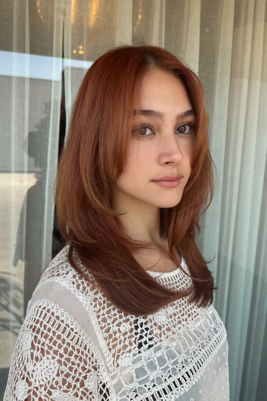 Face-Framing Copper Red Long Layered Hair with Soft Volume