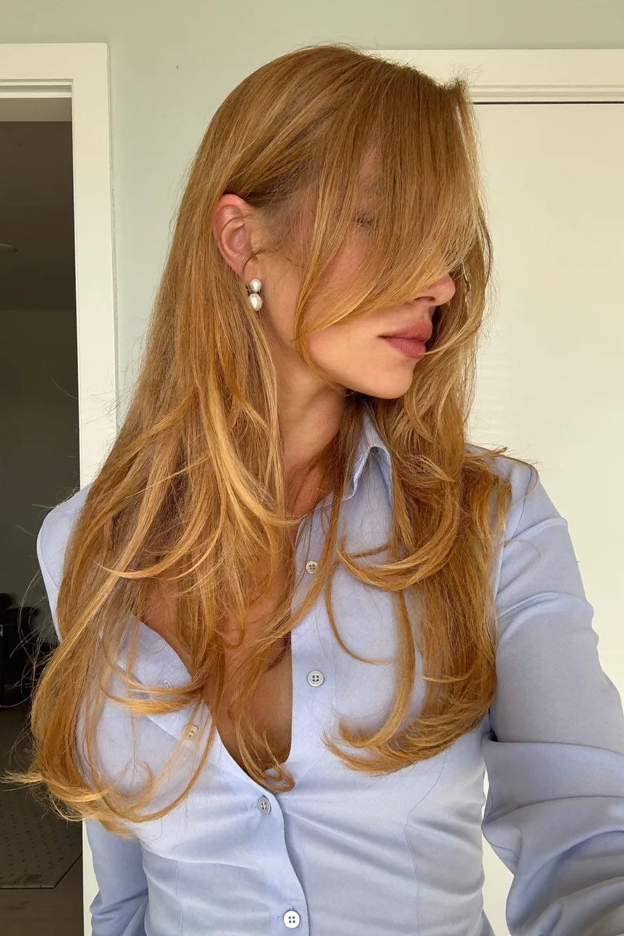 Sleek Extra-Long Layered Cut with Soft Face-Framing Pieces