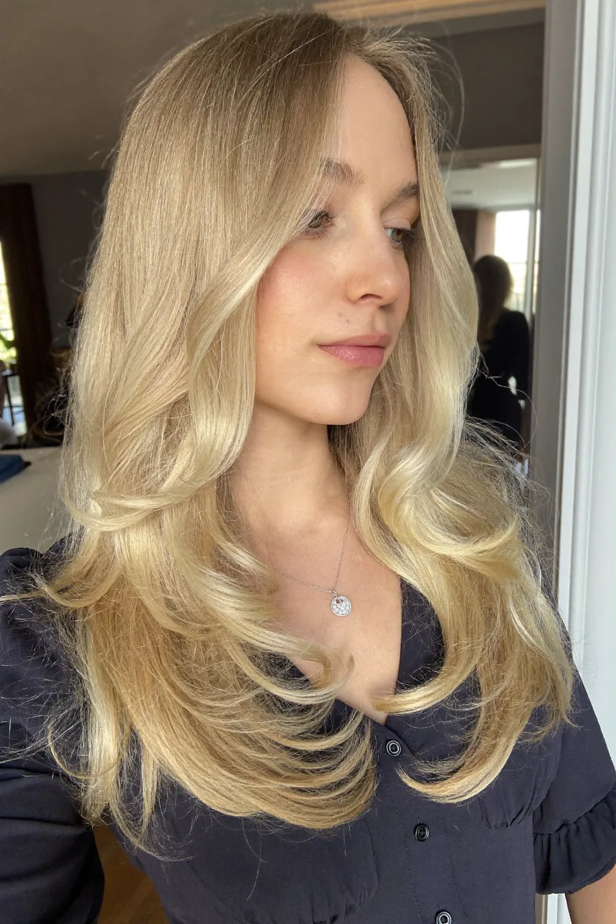 Soft Face-Framing Golden Blonde Long Layered Haircut