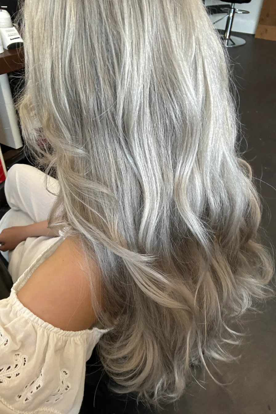 Effortless Silver Long Layered Haircut with Face-Framing Layers