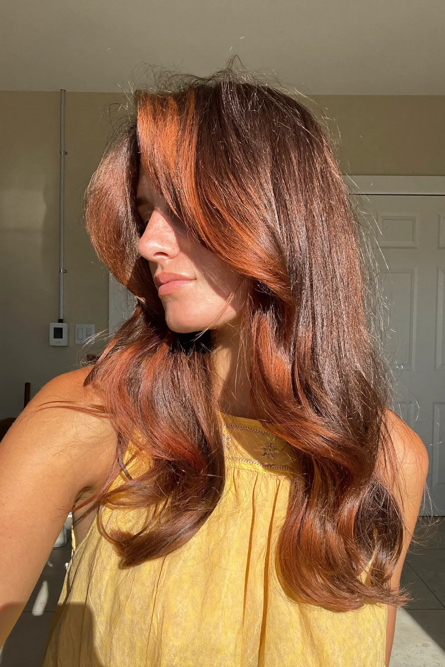 Radiant Long Layered Cut with Voluminous Side-Swept Bangs