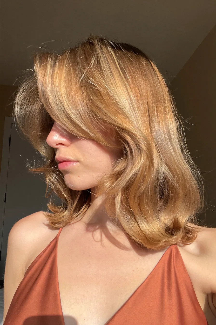 Soft Golden Long Layered Cut with Voluminous Side-Swept Bangs