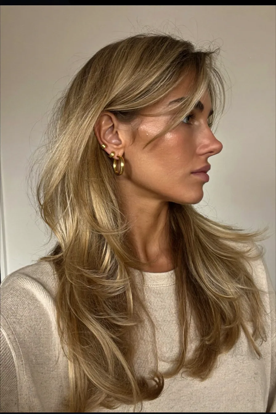 Long Layered Hair with Effortless Side-Swept Bangs for Soft Volume