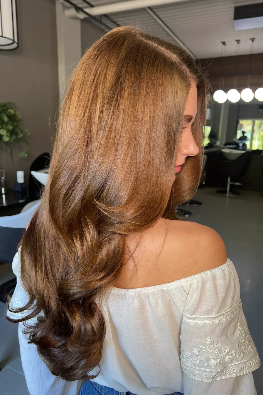 Glossy Soft Waves with Mid-Back Length Layered Haircut