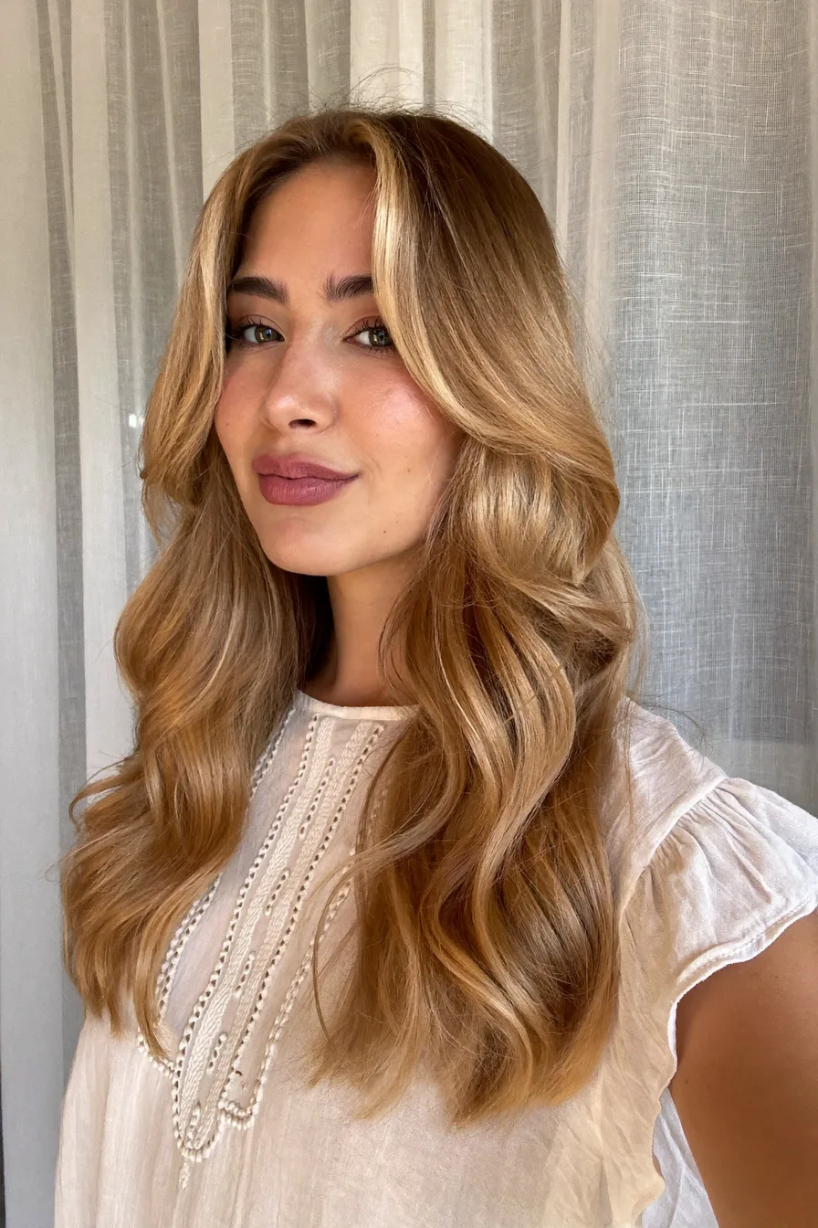 Soft Waves with Mid-Back Length Layered Haircut for Effortless Volume