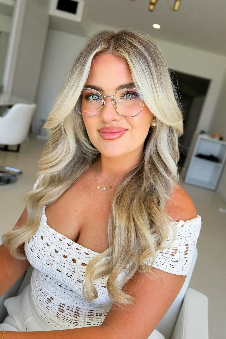 Soft Layered Shoulder-Length Ash Blonde with Face-Framing Highlights
