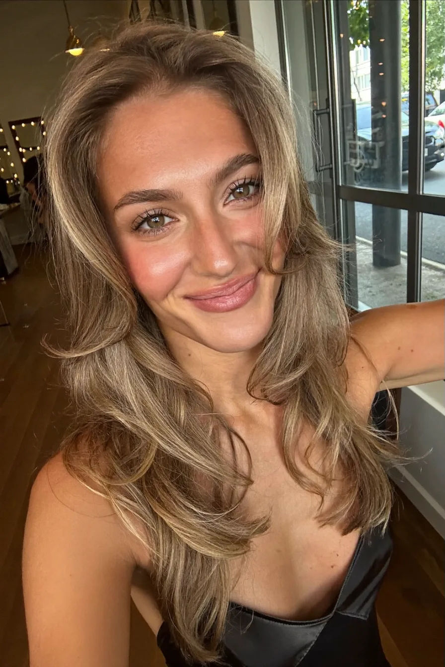 Layered Caramel Brown Shoulder-Length Hair with Face-Framing Volume