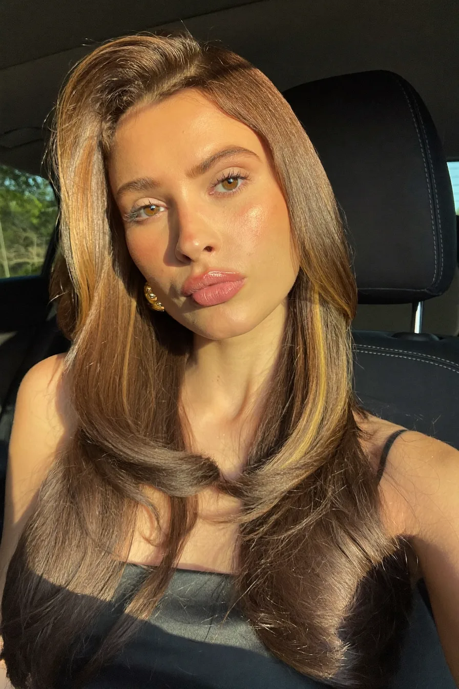 Lustrous Layered Caramel Brown Shoulder-Length Blowout Hairstyle