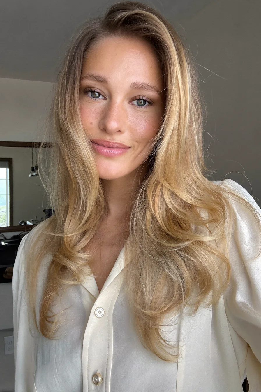 Softly Layered Honey Blonde Shoulder-Length Cut with Face-Framing Waves