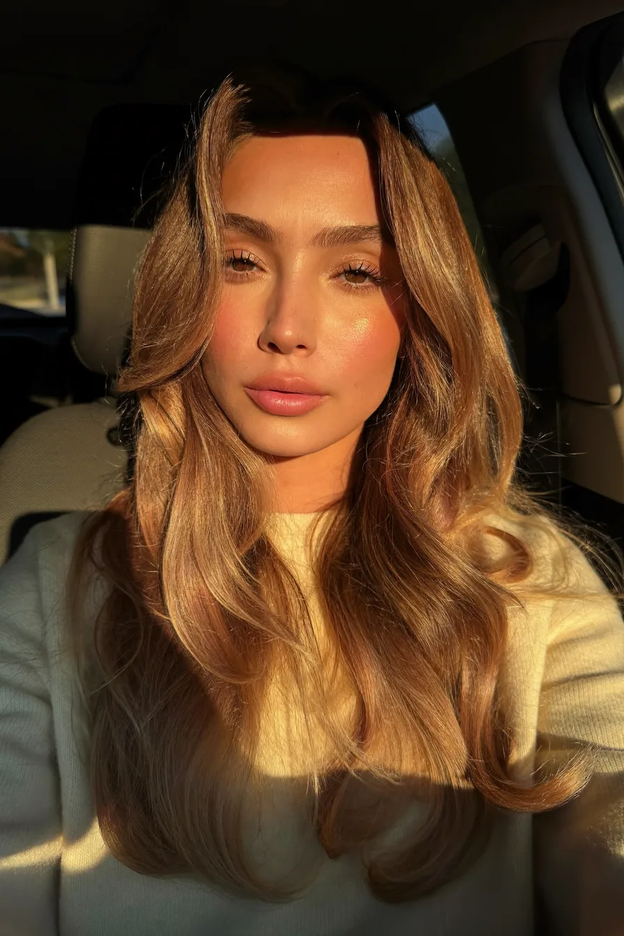 Voluminous Shoulder-Length Layers in Radiant Honey Blonde