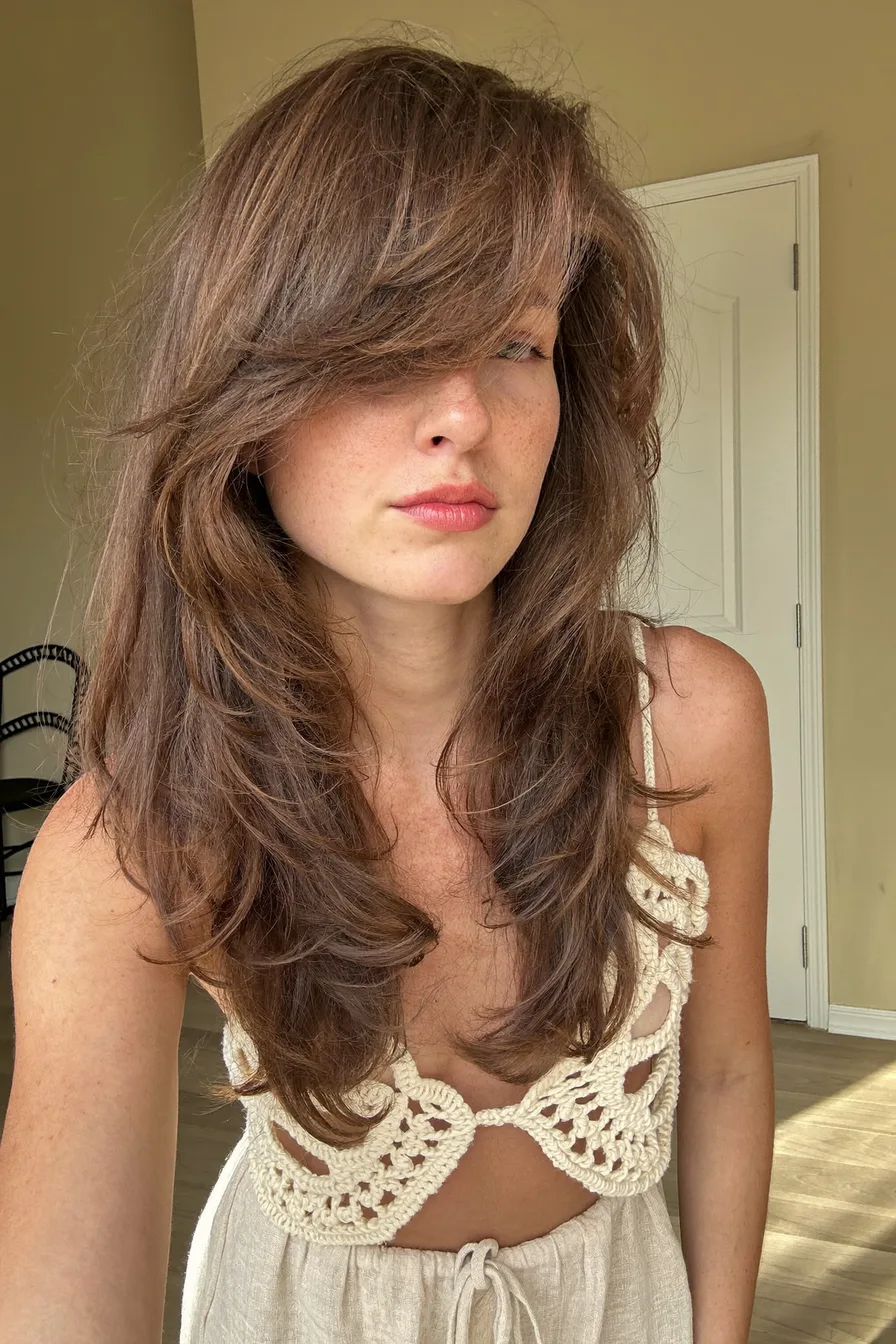 Effortlessly Voluminous Shoulder-Length Layered Haircut with Soft Texture