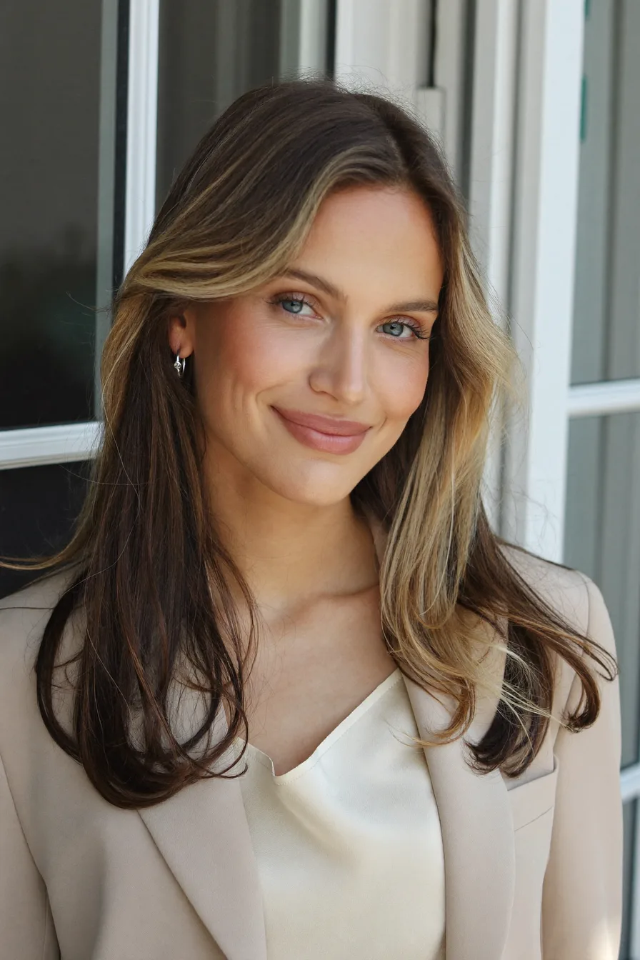 Sleek Straight Long Layered Cut with Defined Curtain Bangs