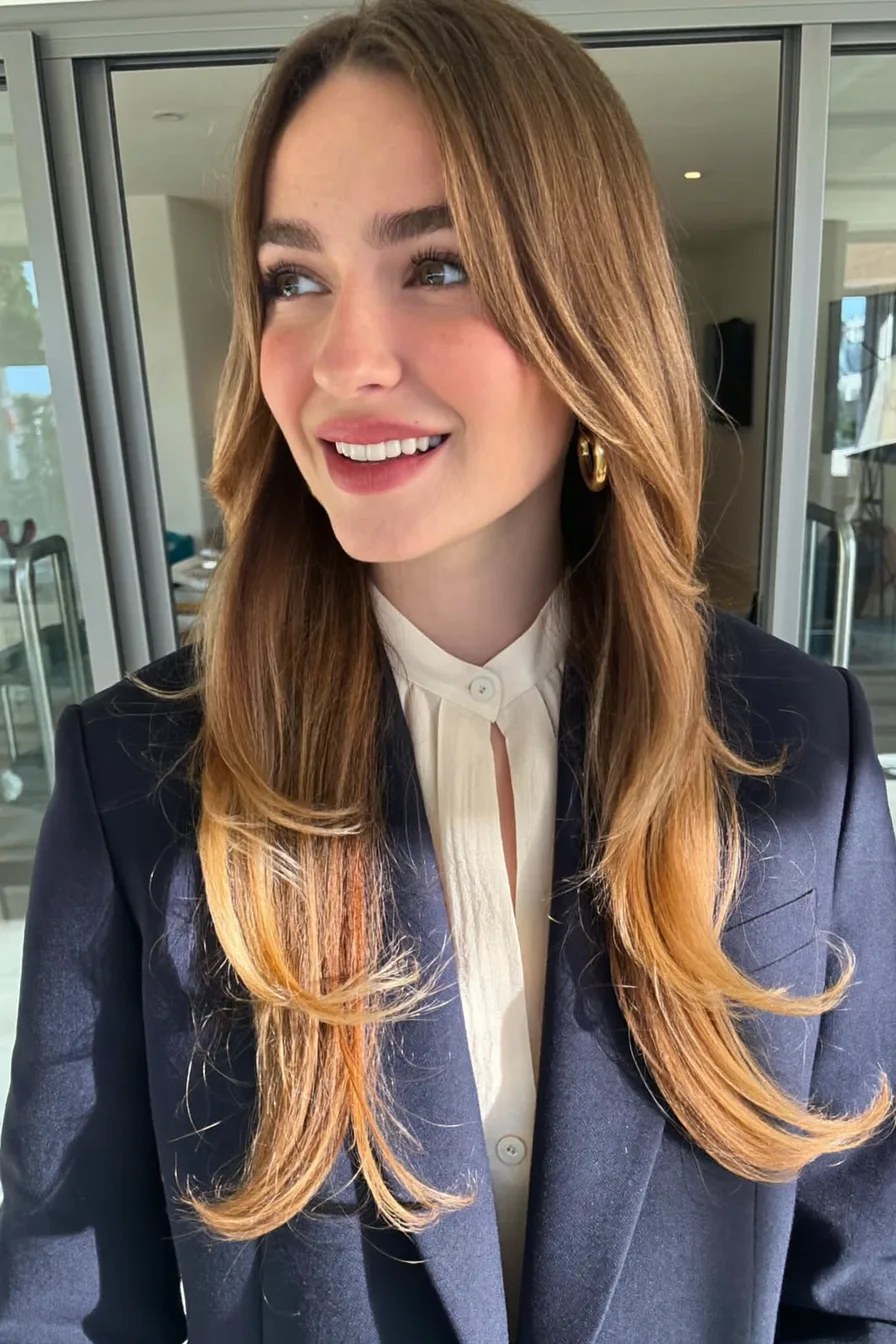 Straight Long Layered Haircut with Face-Framing Curtain Bangs