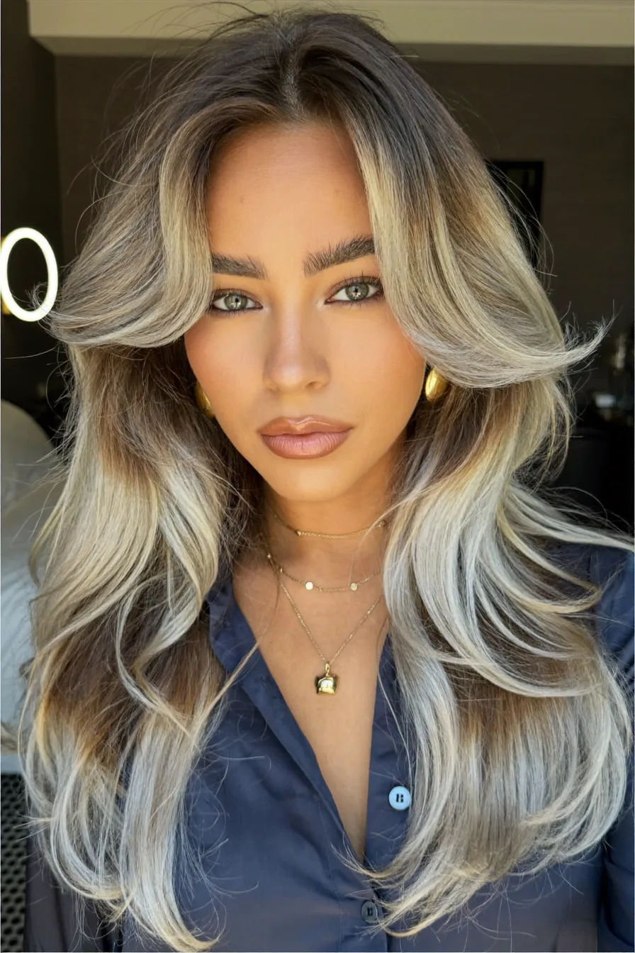 Voluminous Wavy Balayage Blonde Long Layered Hair With Face-Framing