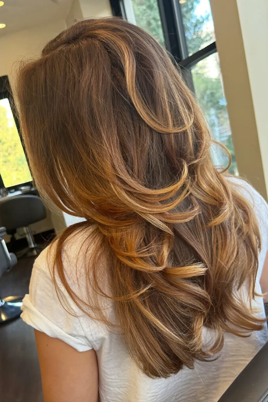 Effortlessly Chic Caramel Brown Wavy Long Layered Haircut Inspiration
