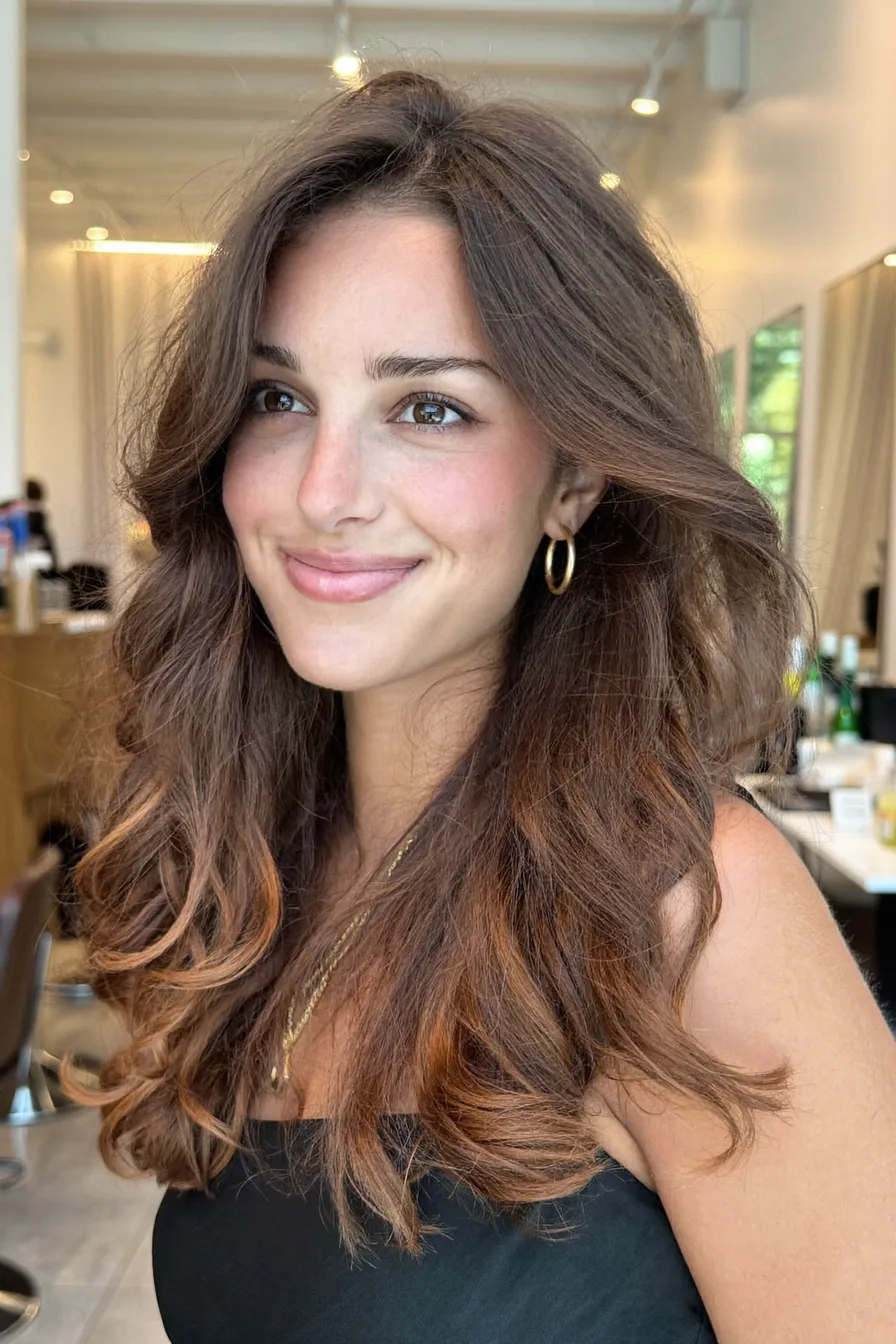 Soft Caramel Brown Wavy Long Layered Hair with Face-Framing Layers