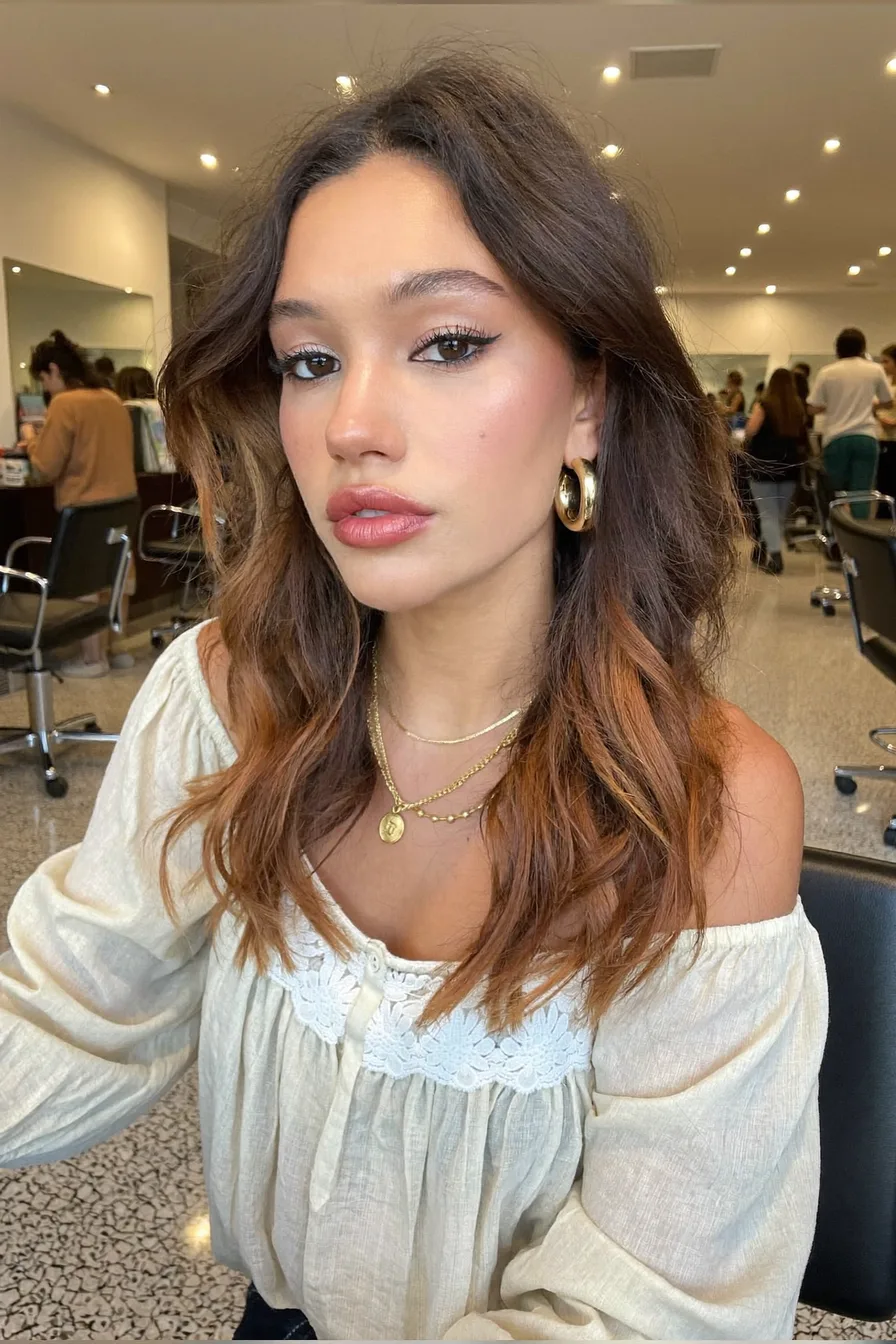 Effortless Caramel Brown Wavy Long Layered Hair with Face-Framing